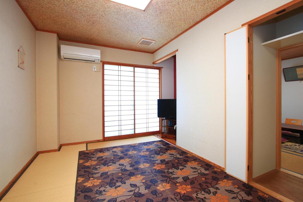 קורומה Ryokan Kinsui חדר תמונה